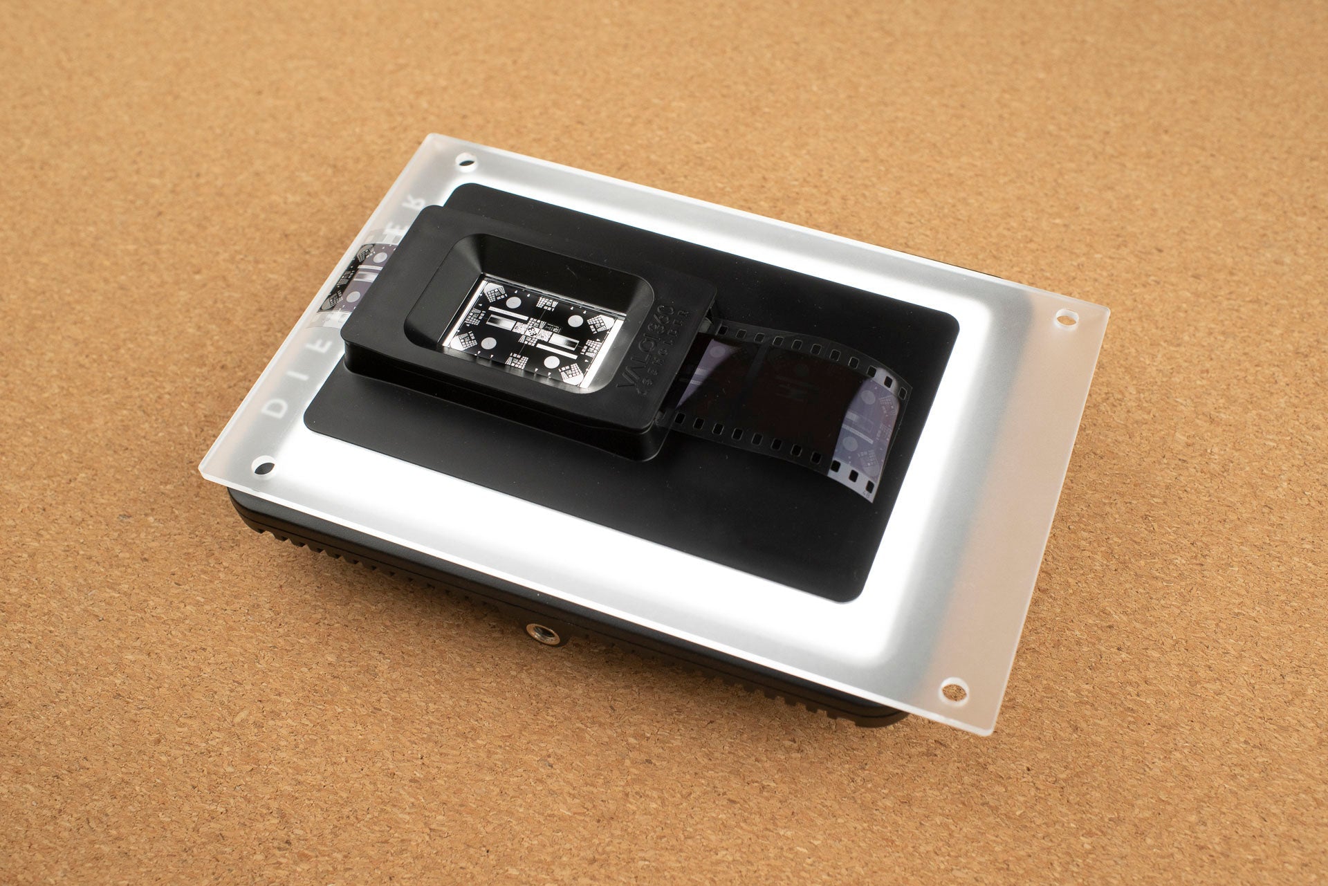 Vlad's Test Targets close-up on a browni background.