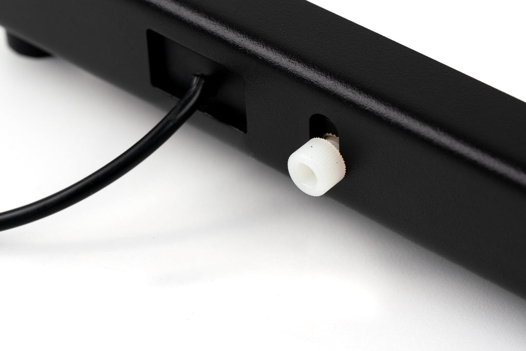 LightAdapter for CS-LITE close-up of a cord and adjustment knob on a white background.