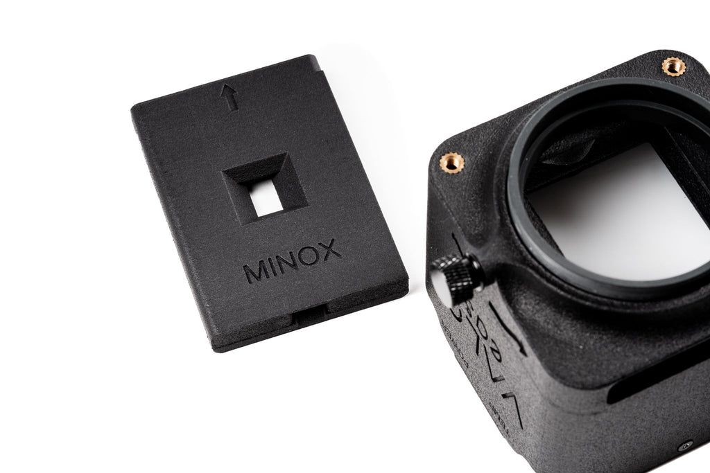 Valoi Minox Holder with a body on a white background.