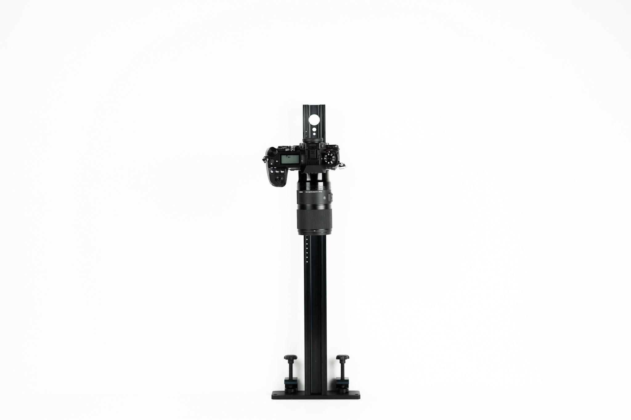 Novoflex Repro 650 stand with a camera body on a white background.