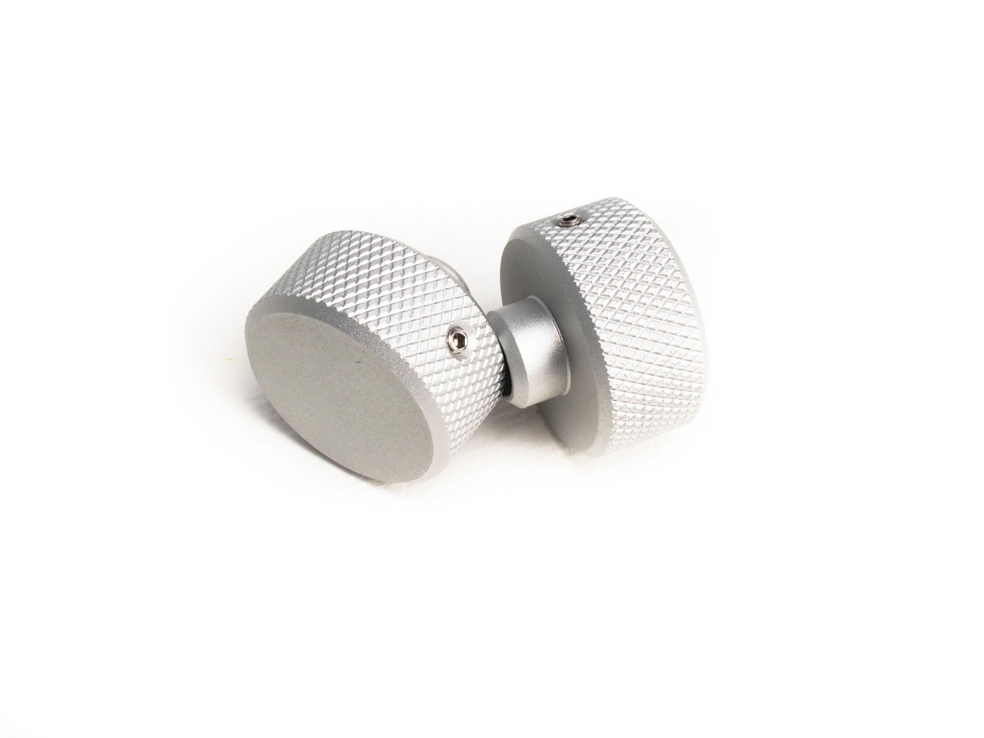 Two v3 advancer knobs on a white background.