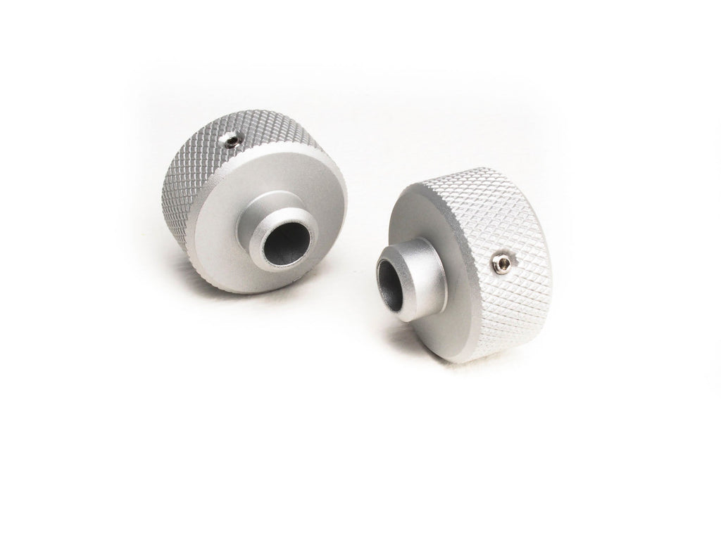 Two separate v3 advancer knobs on a white background.