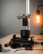 Valoi scanning kit with a camera on a wooden table. 