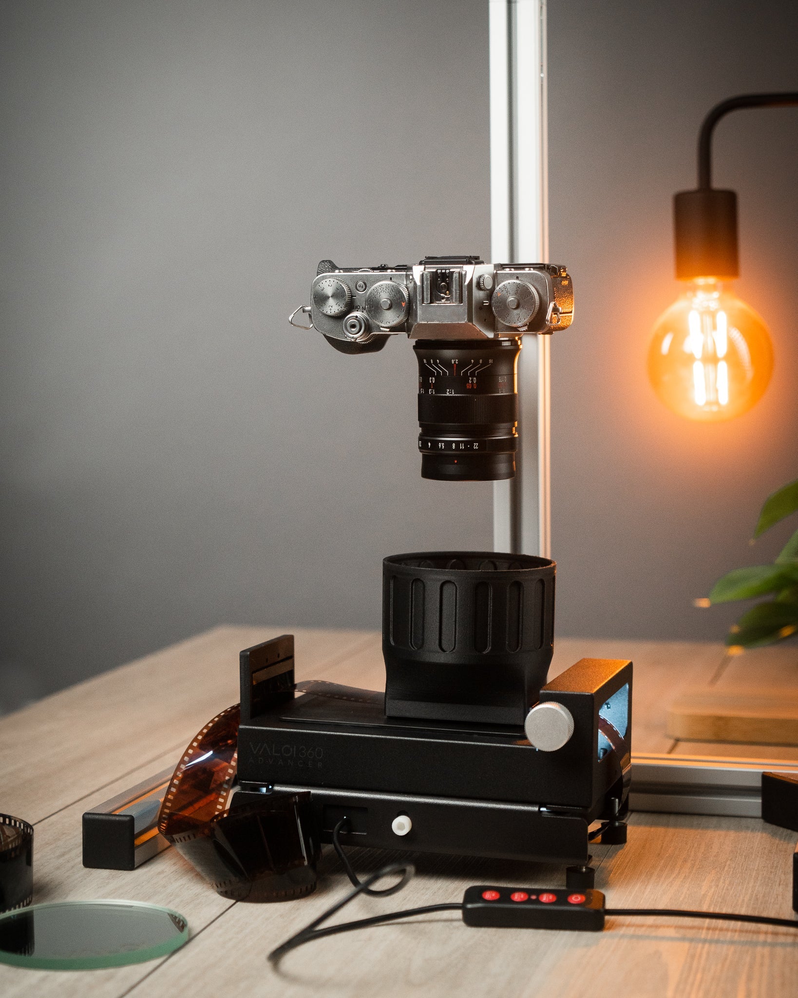 Valoi scanning kit with a camera on a wooden table. 