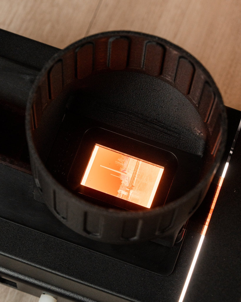 A film negative inside of a Valoi scanning hood. 