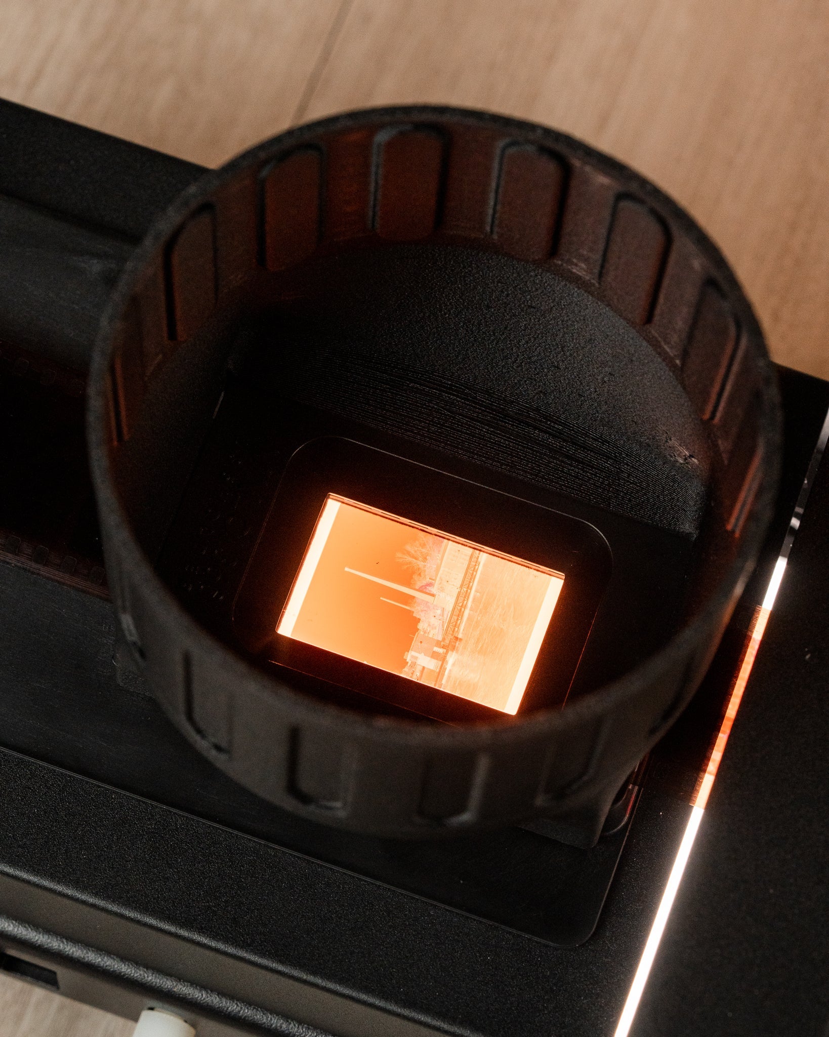 A film negative inside of a Valoi scanning hood. 